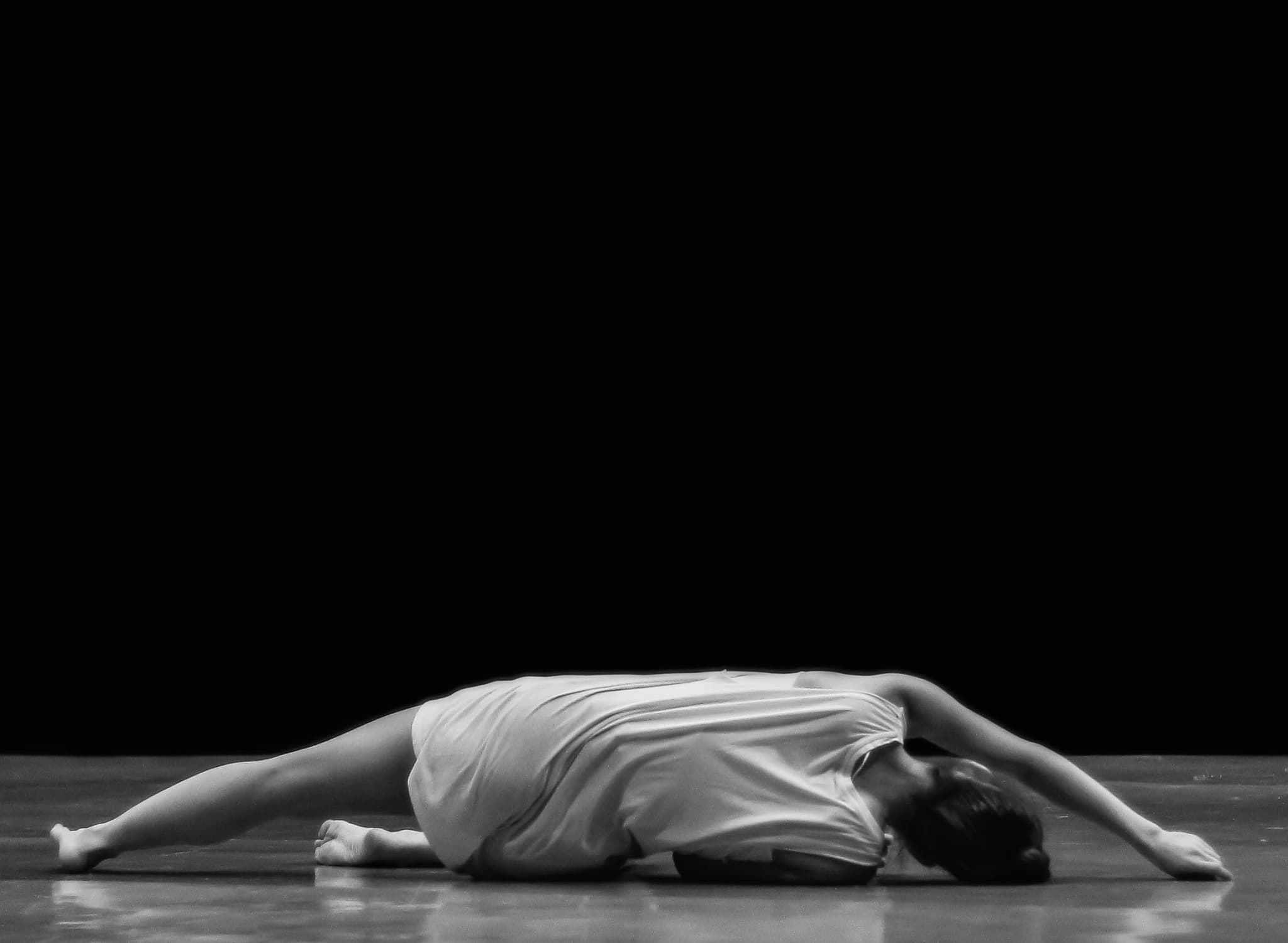 Hands intertwined in a contemporary dance