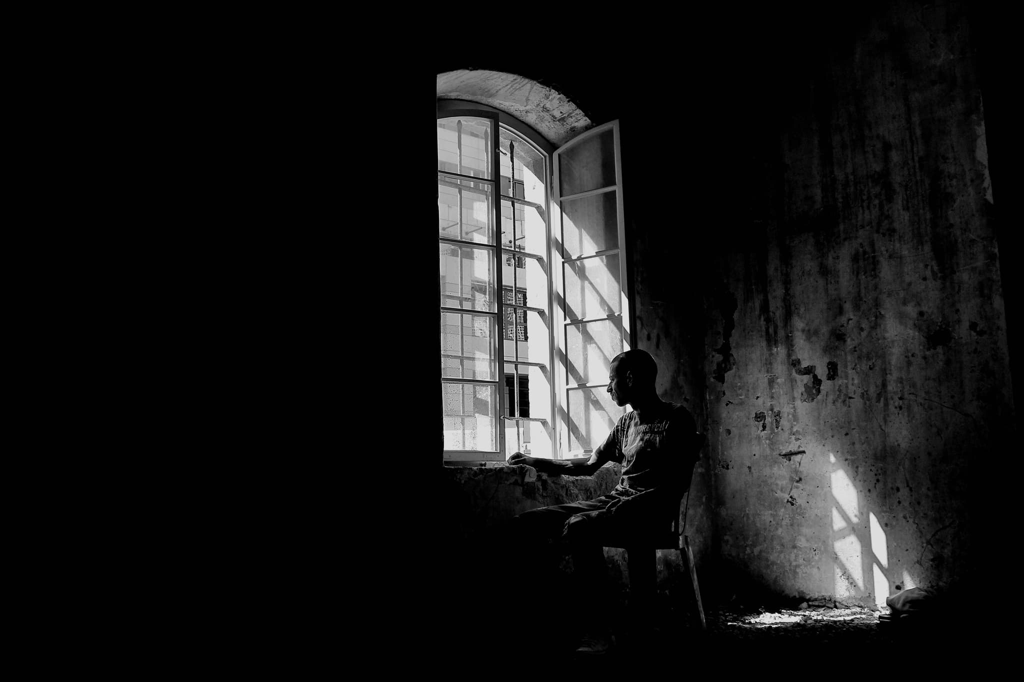 Hands holding an old film camera