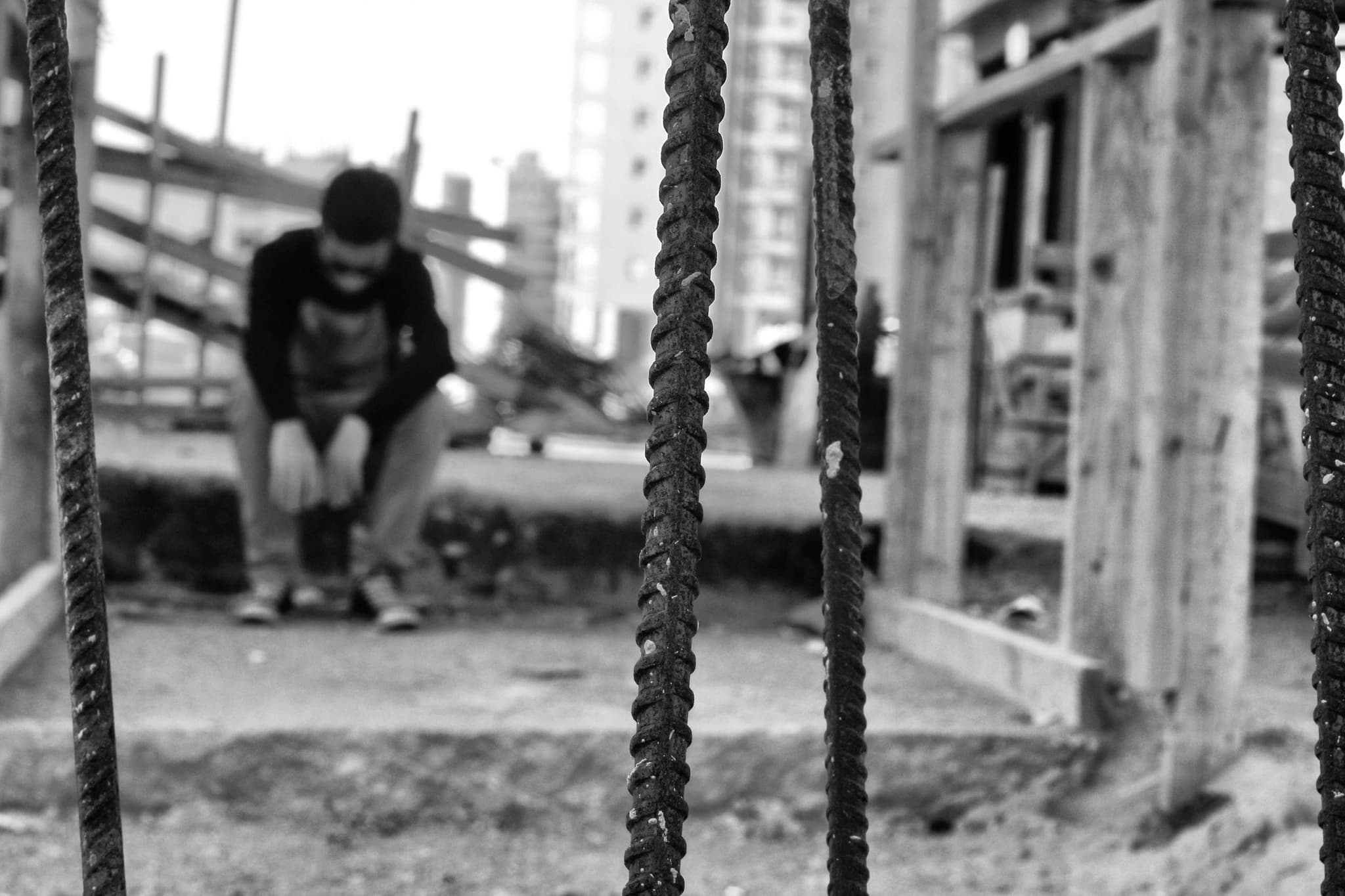 Hands holding an old film camera