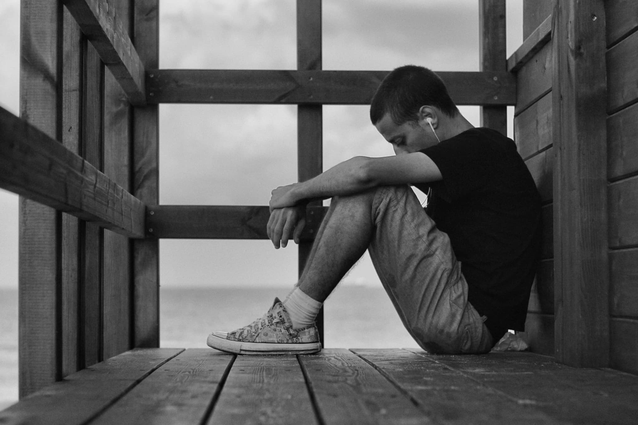 Hands holding an old film camera