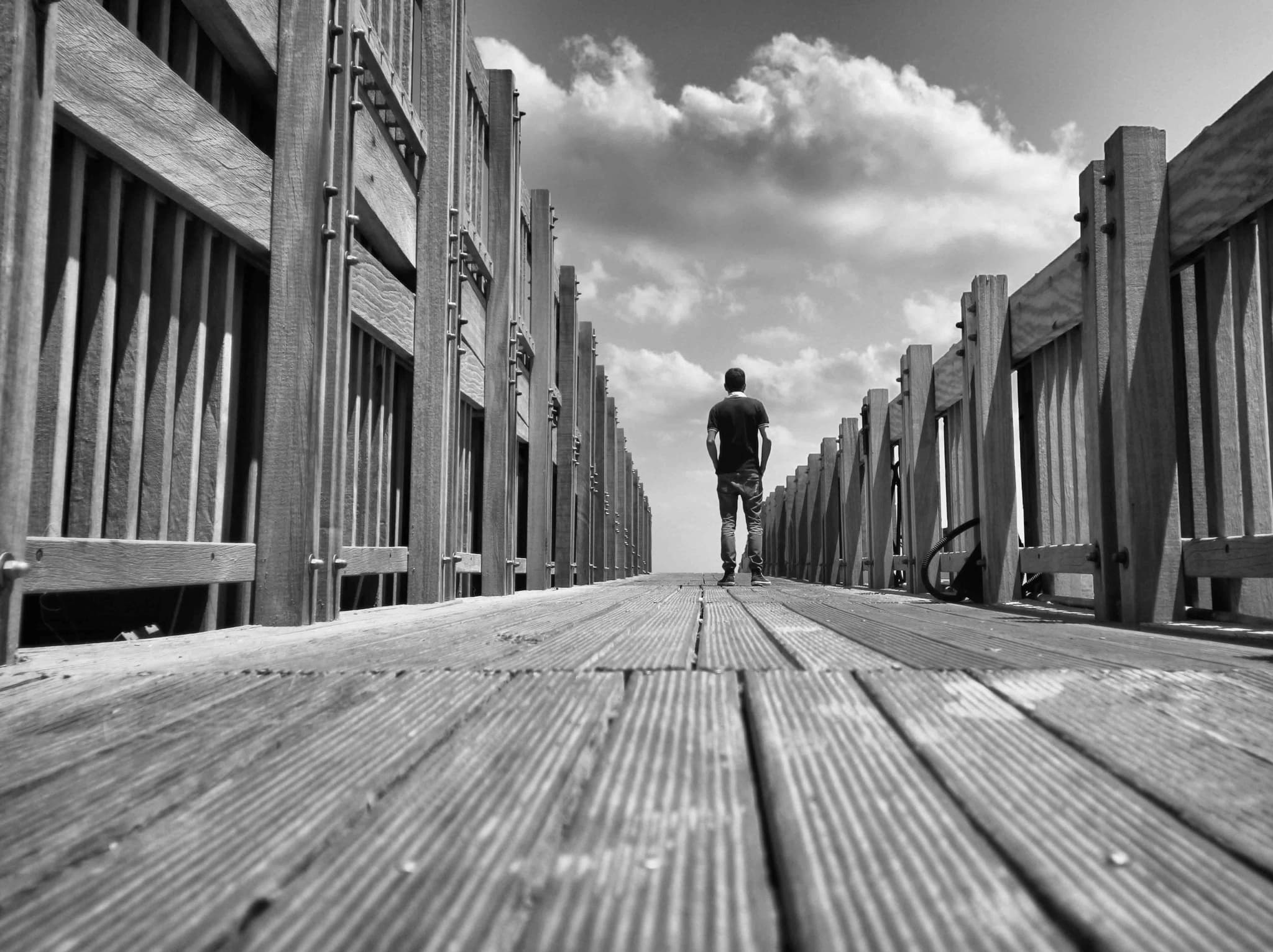 Hands holding an old film camera