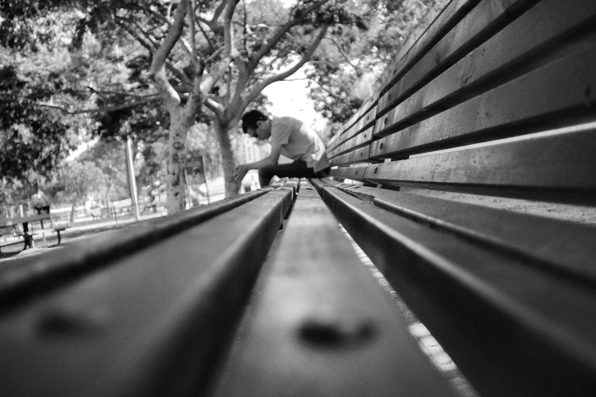 Hands holding an old film camera
