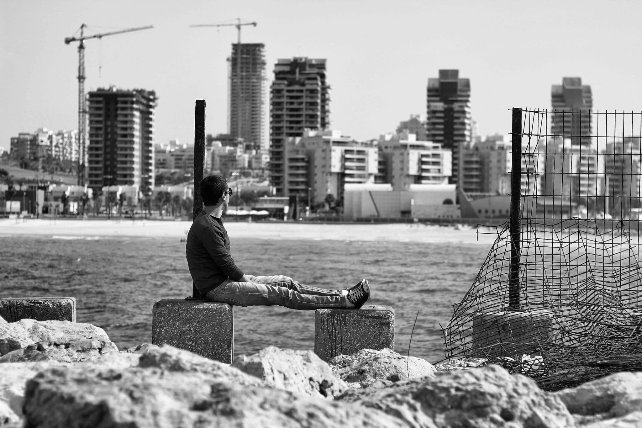 Hands holding an old film camera