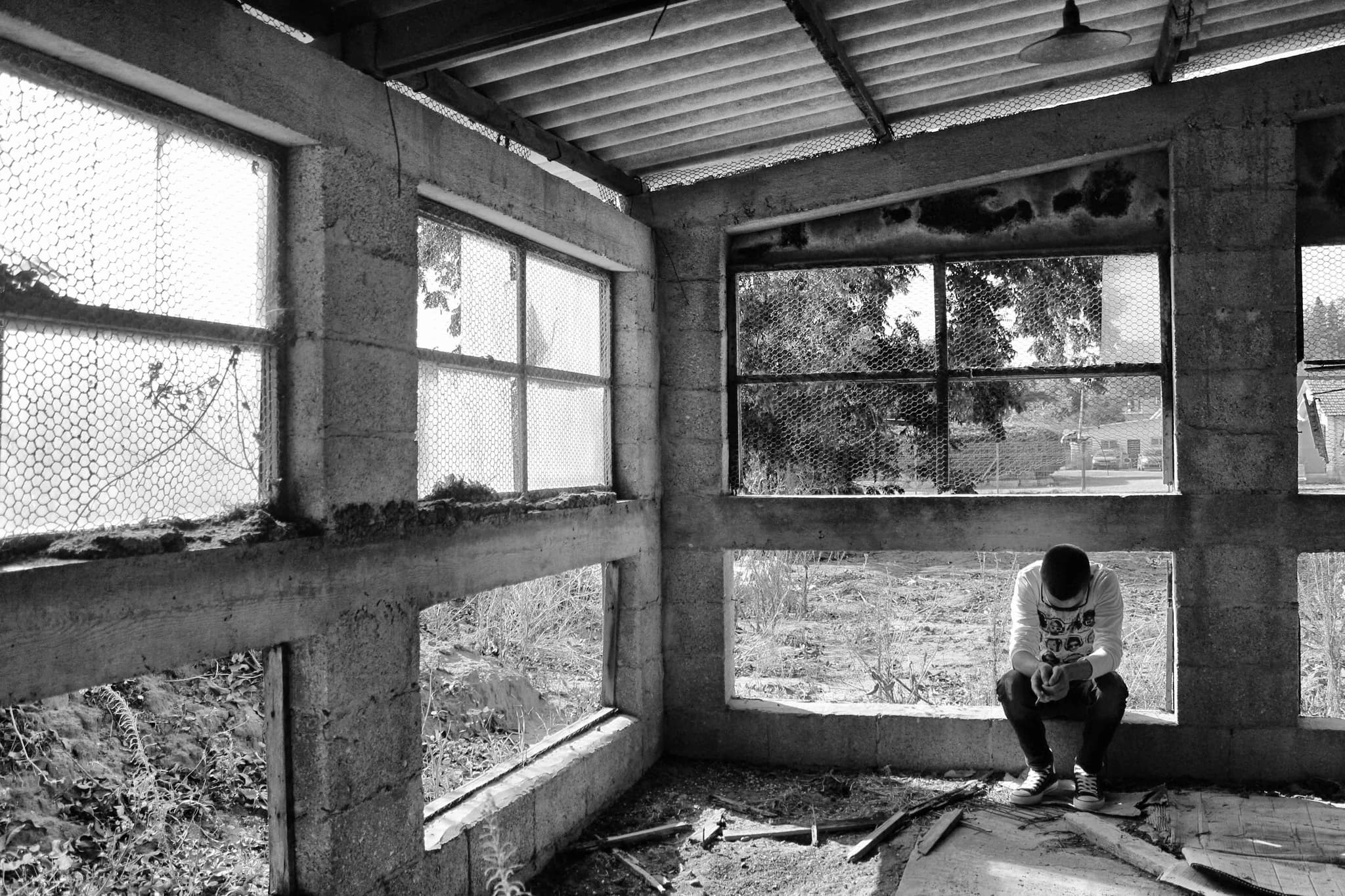 Hands holding an old film camera