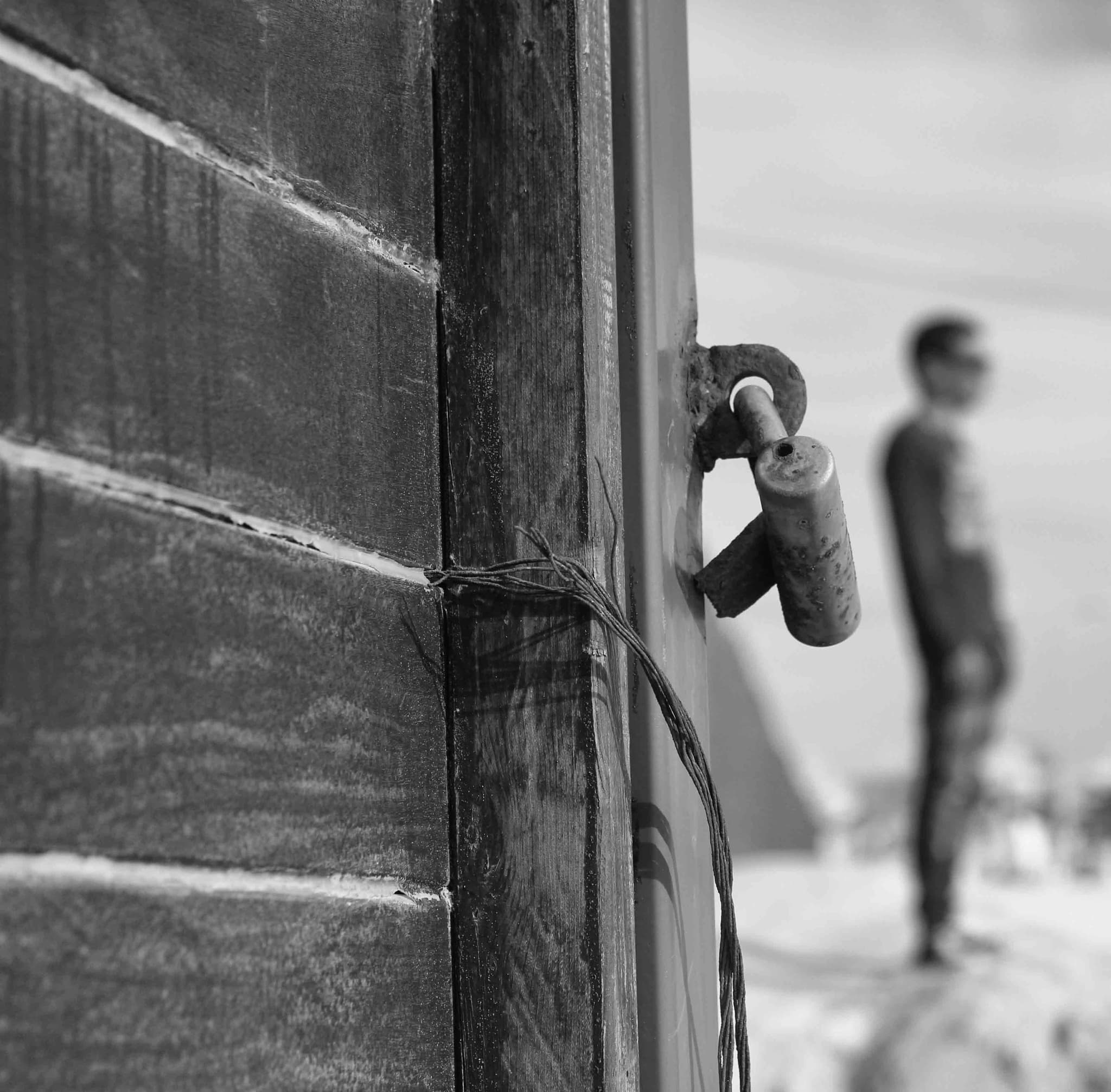 Hands holding an old film camera