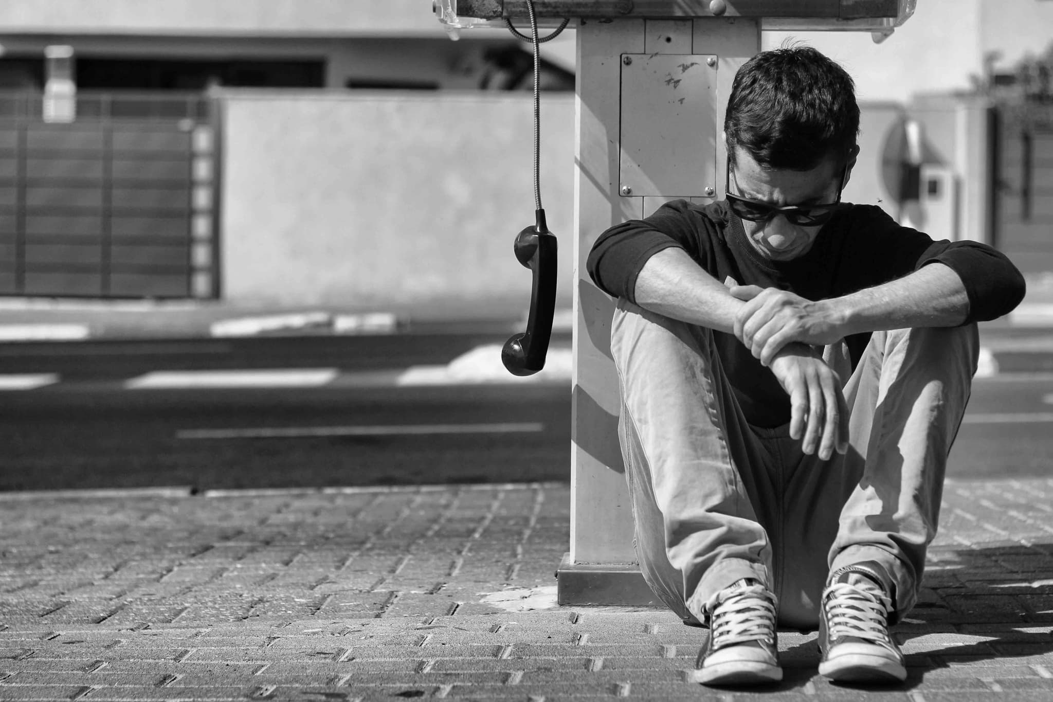 Hands holding an old film camera