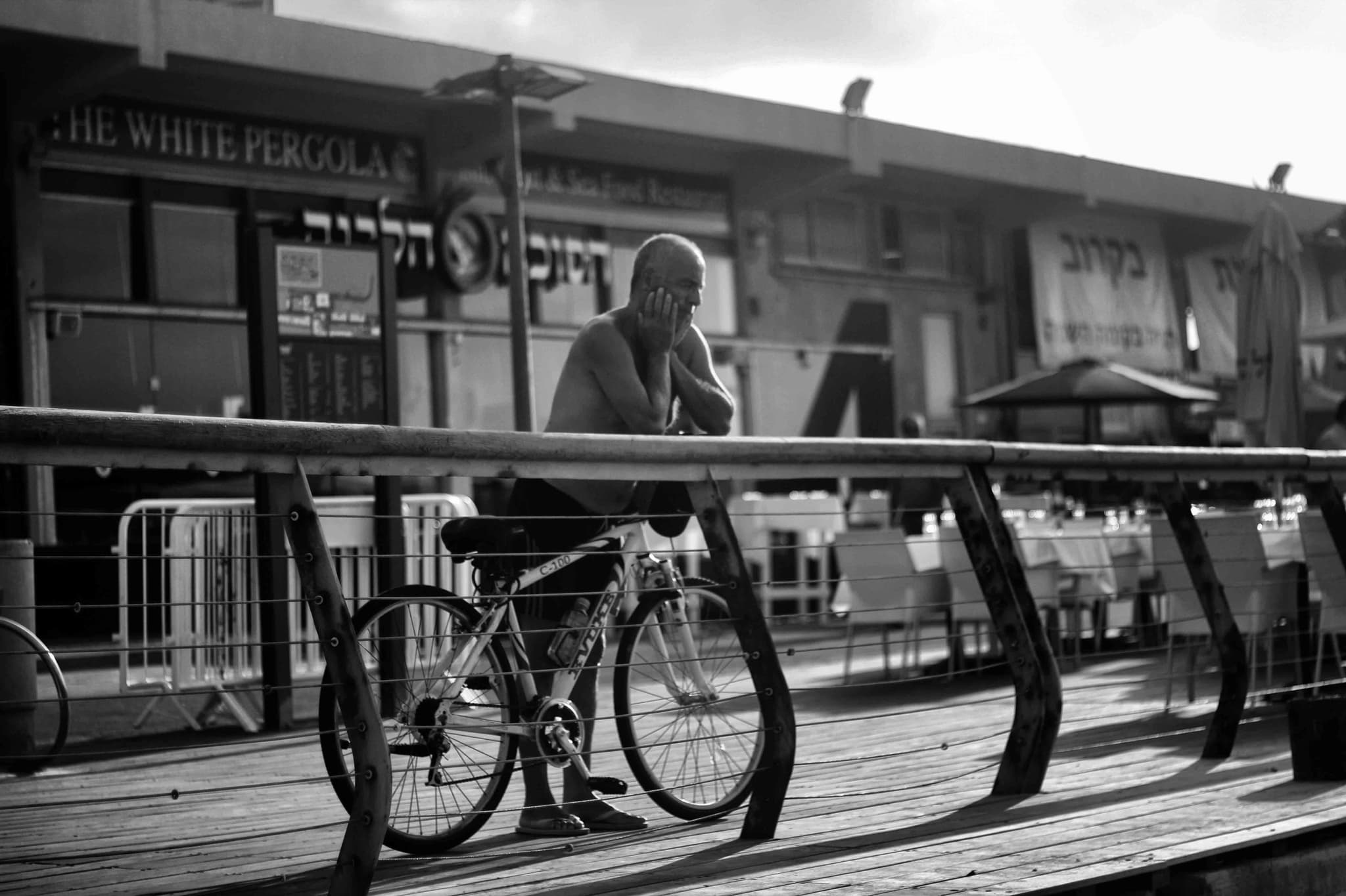 Fingers brushing through tall grass