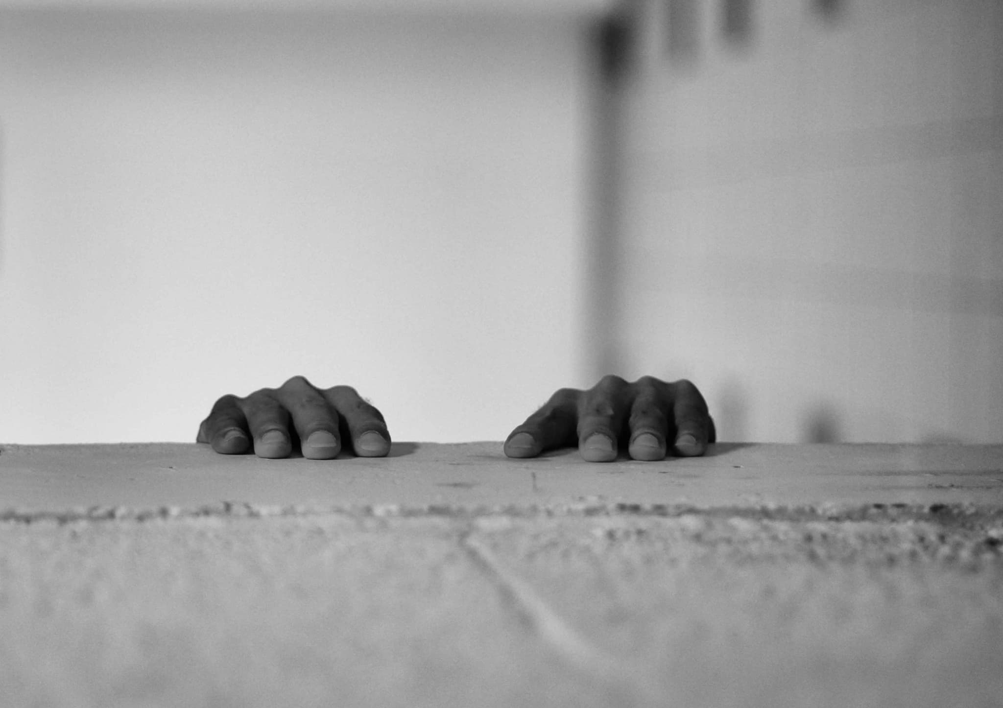 Close-up of weathered hands