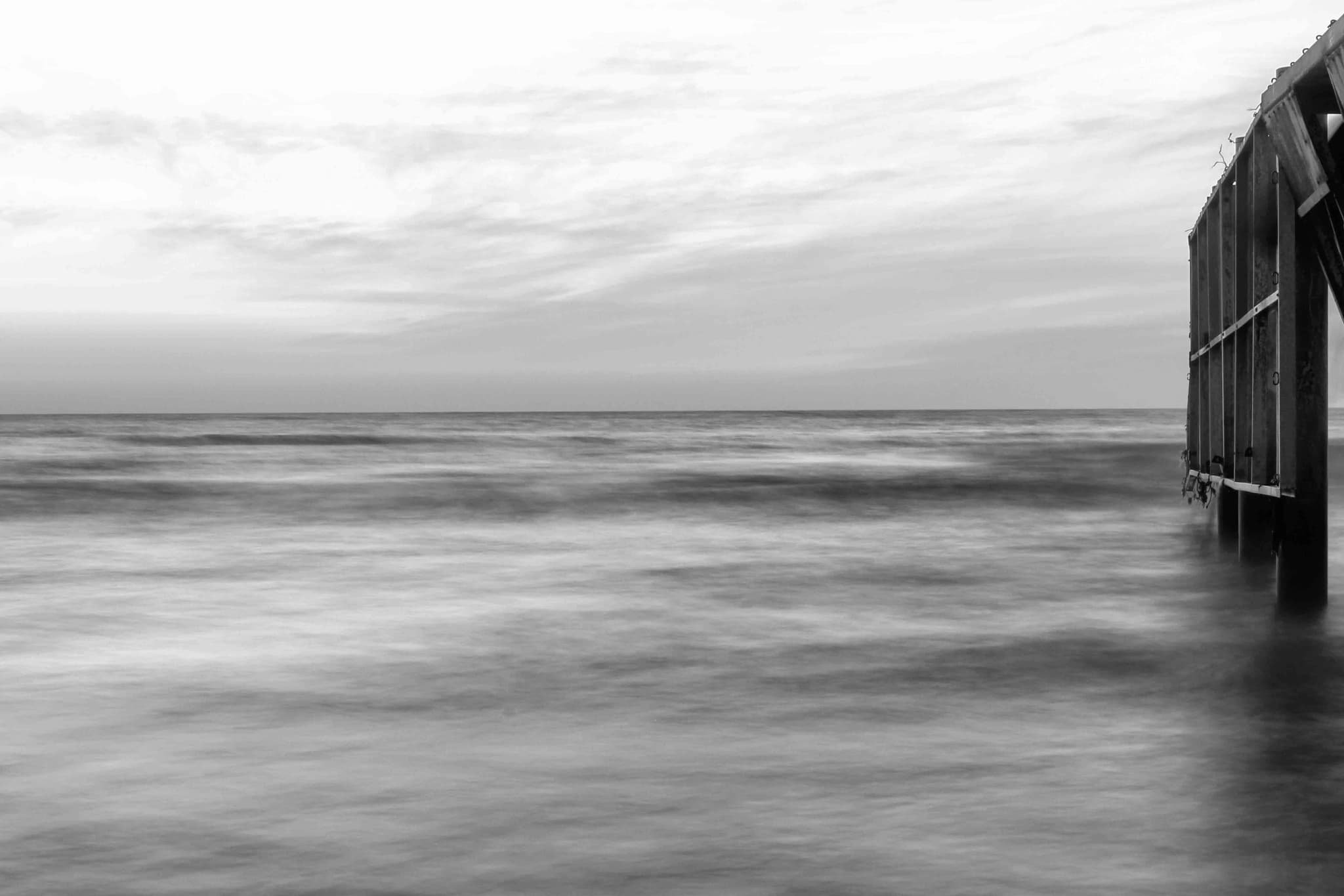 Surfer catching a wave